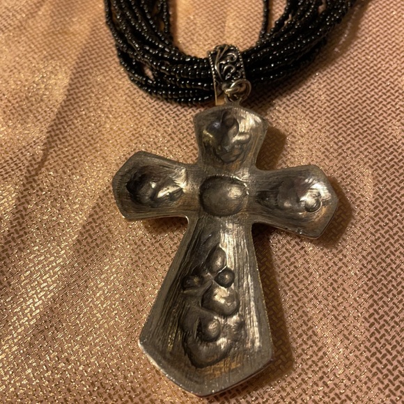 Black multi stranded beaded necklace with silver cross pendant. - Picture 5 of 6